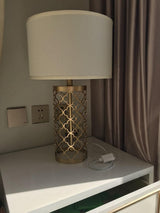 Modern Openwork Gold Metal Table Lamp with Satin Shade for Living Room and Bedroom