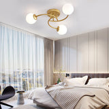 Modern Swirled Metal Flush Mount Light with Elegant Glass Globes for Ambient Bedroom Lighting