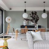 modern-spherical-glass-pendant-light-with-polished-metal-accents-for-luxury-interiors