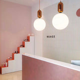 modern-spherical-glass-pendant-light-with-polished-metal-accents-for-luxury-interiors