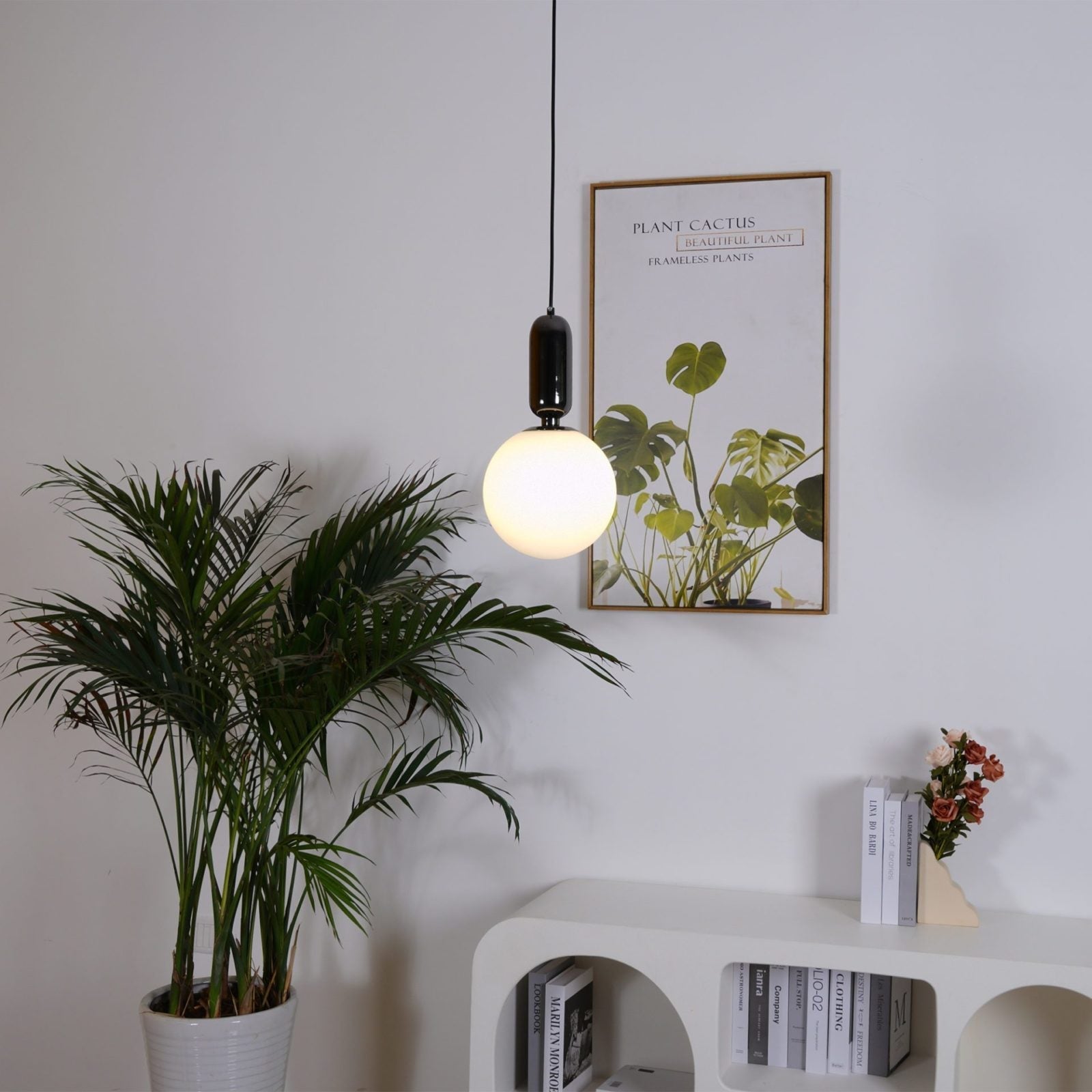 modern-spherical-glass-pendant-light-with-polished-metal-accents-for-luxury-interiors