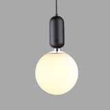 modern-spherical-glass-pendant-light-with-polished-metal-accents-for-luxury-interiors