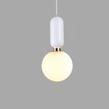 modern-spherical-glass-pendant-light-with-polished-metal-accents-for-luxury-interiors