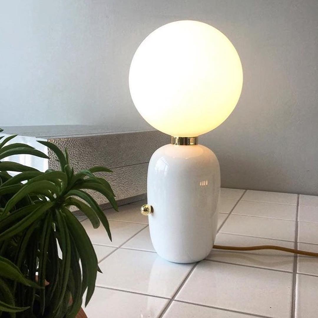Modern Glass Globe Table Lamp with Polished Metal Frame for Modern Ambient Lighting