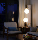 Modern Glass Globe Table Lamp with Polished Metal Frame for Modern Ambient Lighting