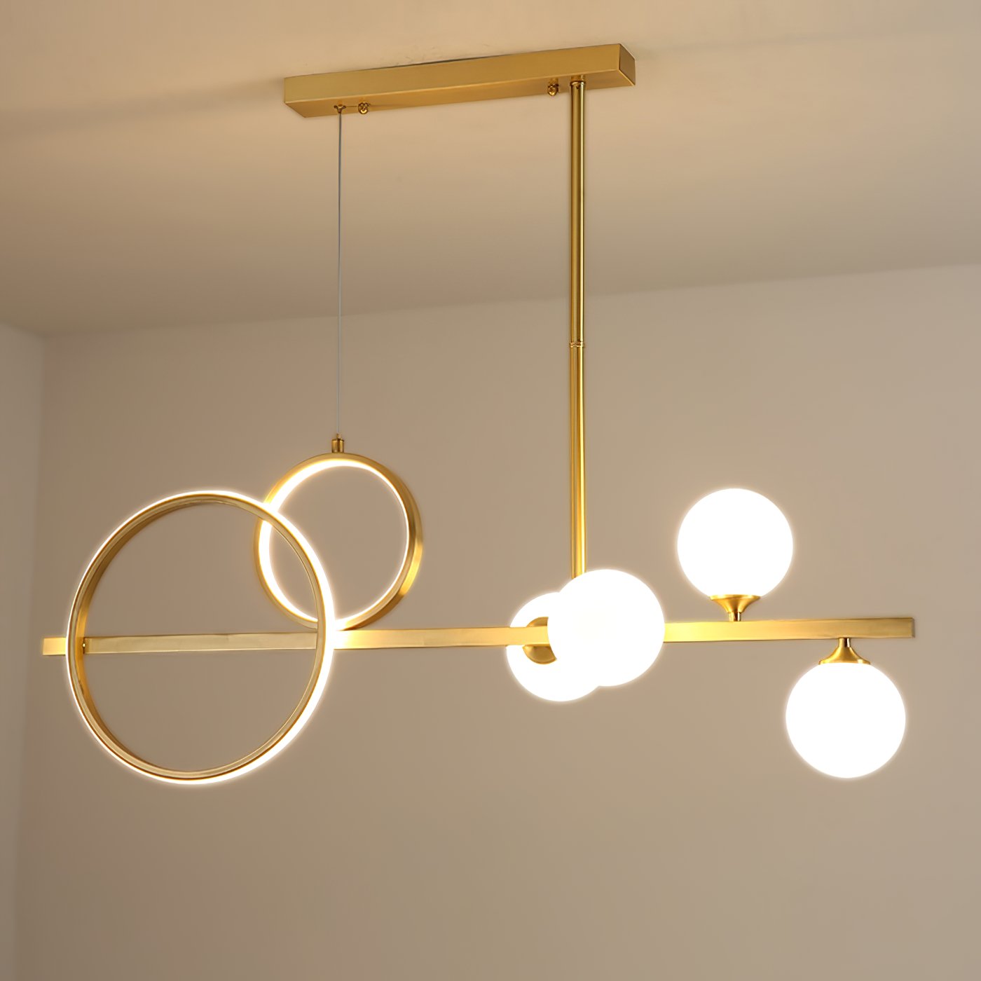 modern-brass-led-linear-chandelier-with-white-glass-spheres-for-restaurant-and-dining-room