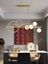 modern-brass-led-linear-chandelier-with-white-glass-spheres-for-restaurant-and-dining-room