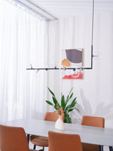 modern-linear-chandelier-with-clear-glass-globe-shades-for-geometric-dining-room-lighting