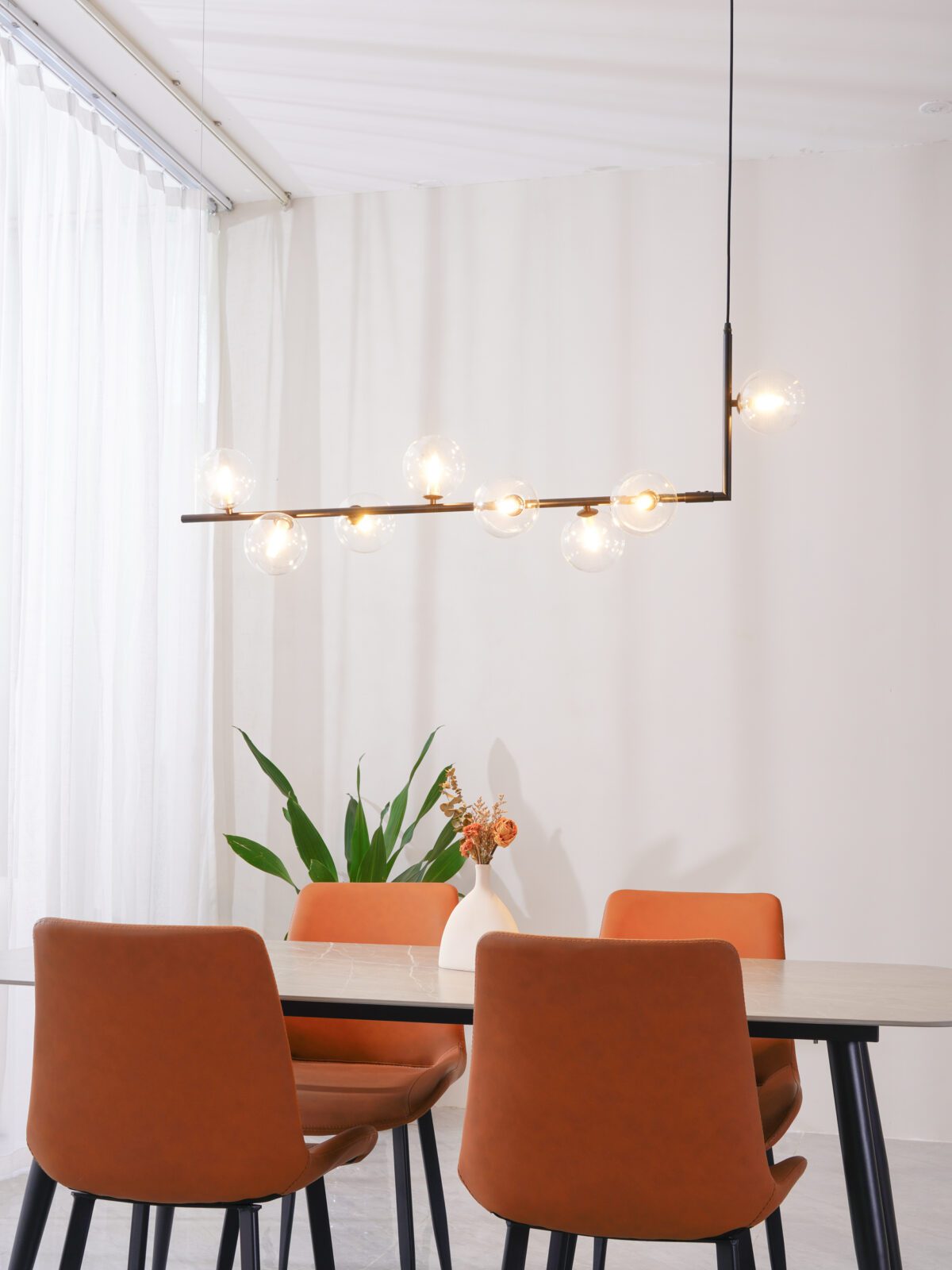 modern-linear-chandelier-with-clear-glass-globe-shades-for-geometric-dining-room-lighting