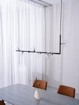 modern-linear-chandelier-with-clear-glass-globe-shades-for-geometric-dining-room-lighting