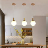 modern-minimalist-rubber-wood-pendant-light-with-white-glass-globe-shade