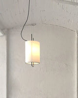 modern-geometric-pendant-light-with-white-fabric-cylindrical-shade-and-gold-metal-finish