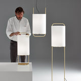 modern-geometric-pendant-light-with-white-fabric-cylindrical-shade-and-gold-metal-finish