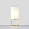 modern-minimalist-geometric-table-lamp-with-white-cloth-shade-and-gold-metal-base-for-elegant-interiors