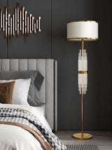 Modern Tall Linear Floor Lamp with Gold Metal Accents and Beige Fabric Shade