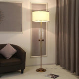 Modern Tall Linear Floor Lamp with Gold Metal Accents and Beige Fabric Shade