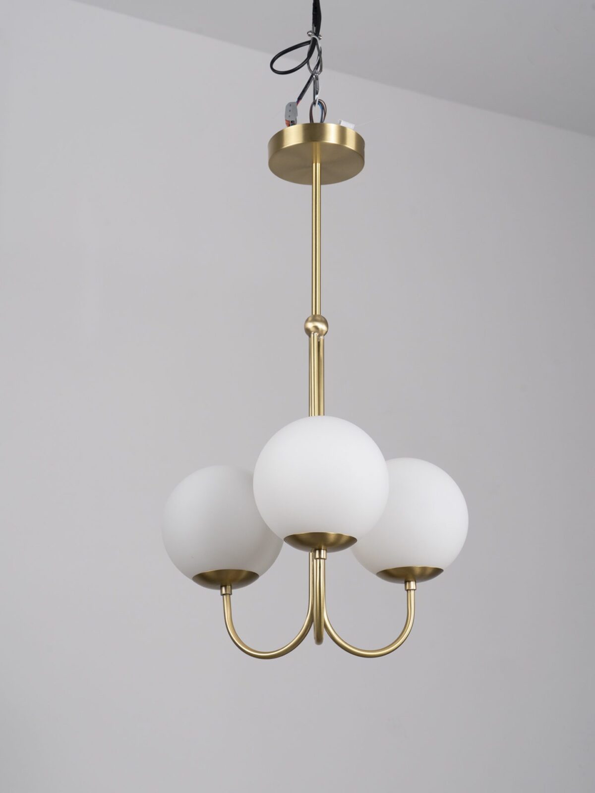 mid-century-modern-triple-angle-brass-pendant-lamp-with-opal-glass-globe-shade