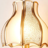 elegant-brass-and-white-glass-wall-sconce-light-fixture-for-modern-interior-spaces
