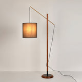 archer-contemporary-arched-wood-standing-lamp-with-adjustable-linen-drum-shade