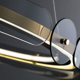 modern-gold-round-led-pendant-light-with-smoke-gray-glass-for-dining-room