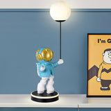 Creative Astronaut Planet Resin Table Lamp Modern Sculptural Bedside Lighting for Kids Room
