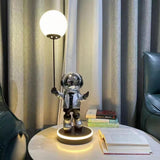 Creative Astronaut Planet Resin Table Lamp Modern Sculptural Bedside Lighting for Kids Room