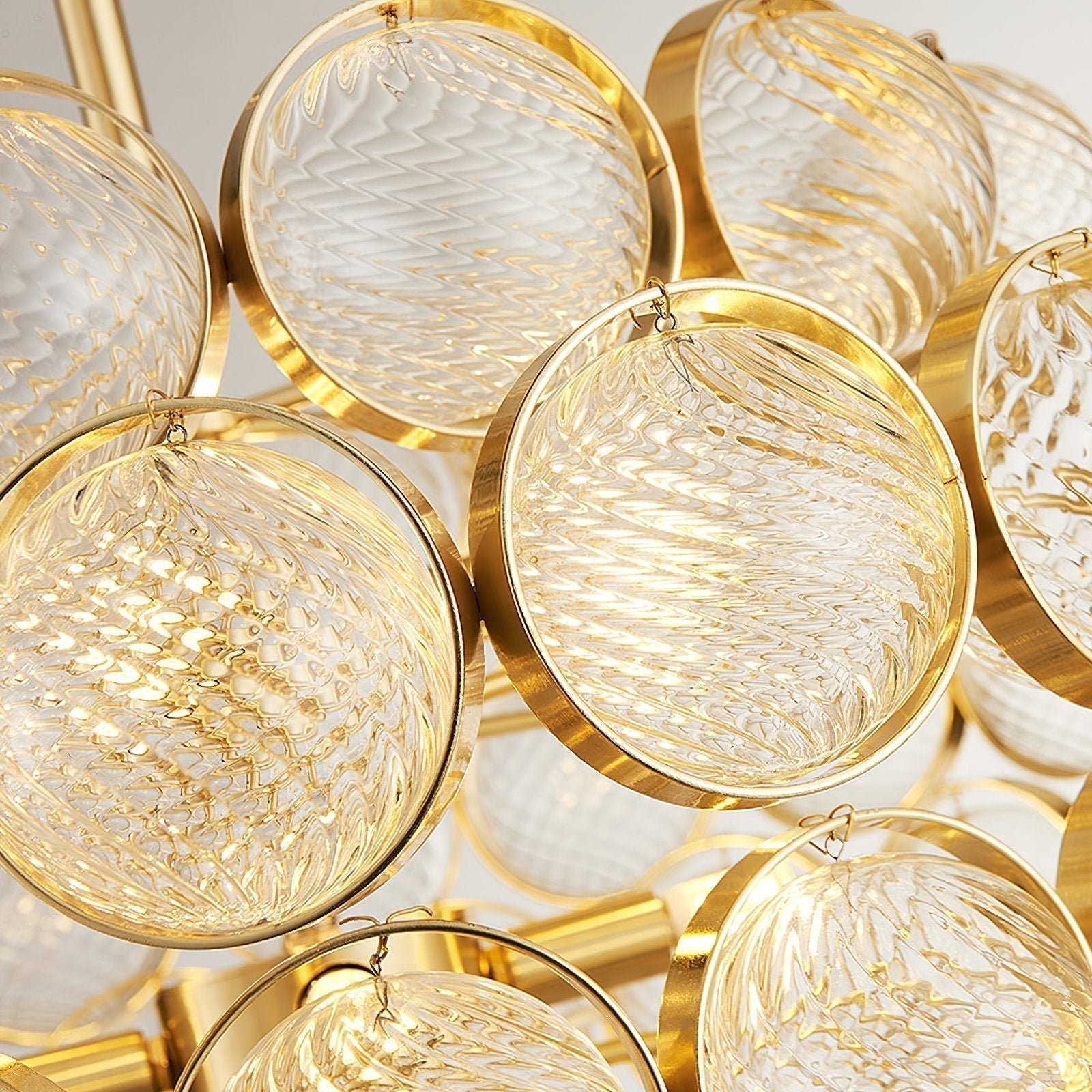 luxury-modern-glass-sphere-chandelier-with-spiral-ribbed-texture-and-satin-gold-finish