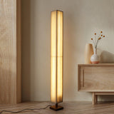 elegant-minimalist-fabric-cylinder-standing-lamp-with-natural-wood-base