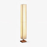 elegant-minimalist-fabric-cylinder-standing-lamp-with-natural-wood-base