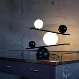 Modern Artistic Balance Table Lamp with Glass Spheres and Black Marble Base