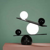 Modern Artistic Balance Table Lamp with Glass Spheres and Black Marble Base