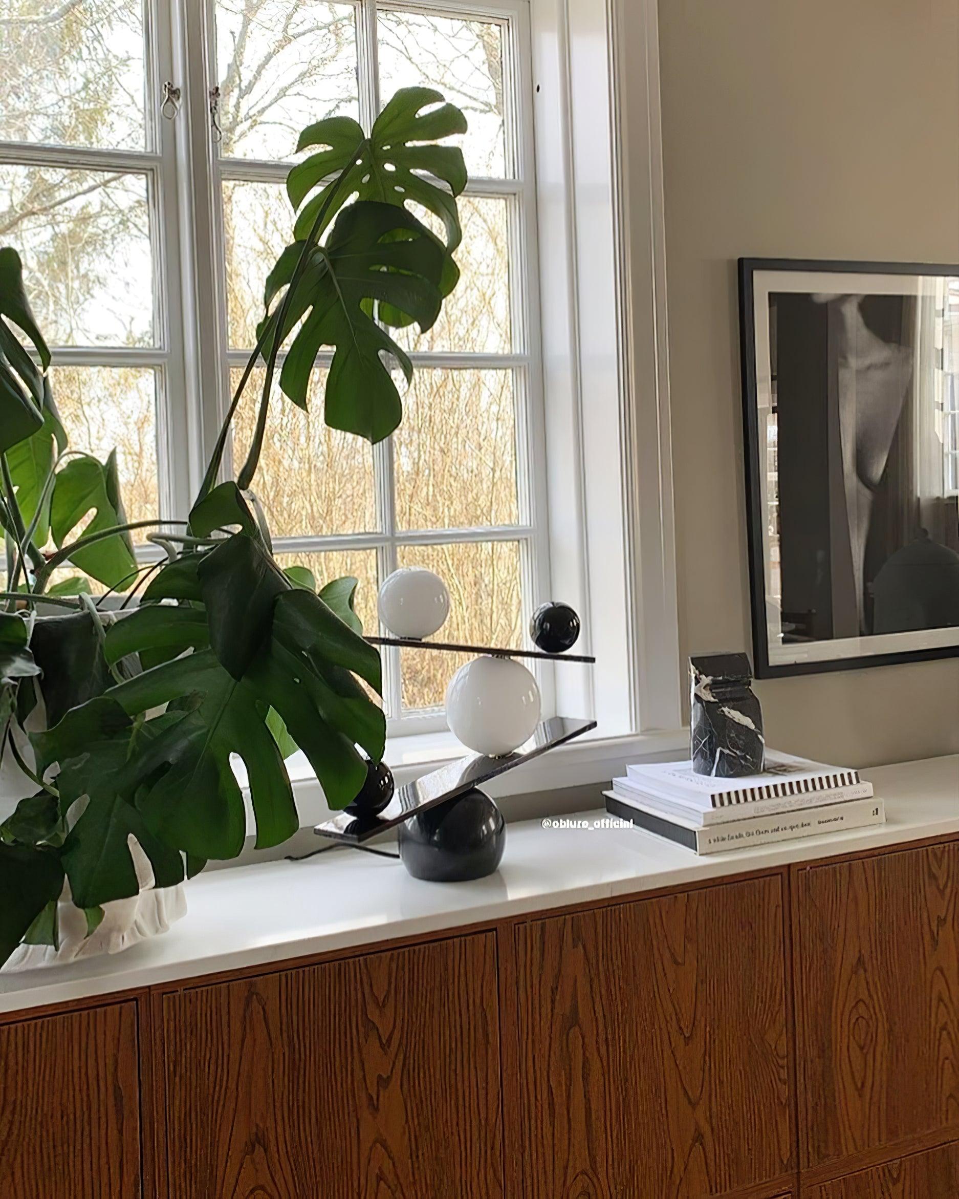 Modern Artistic Balance Table Lamp with Glass Spheres and Black Marble Base