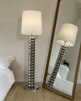 modern-stacked-wood-ring-floor-lamp-with-fabric-shade-and-metal-base