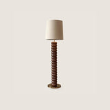 modern-stacked-wood-ring-floor-lamp-with-fabric-shade-and-metal-base