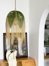vintage-style-velvet-fringed-pendant-light-with-tassels-and-brass-details