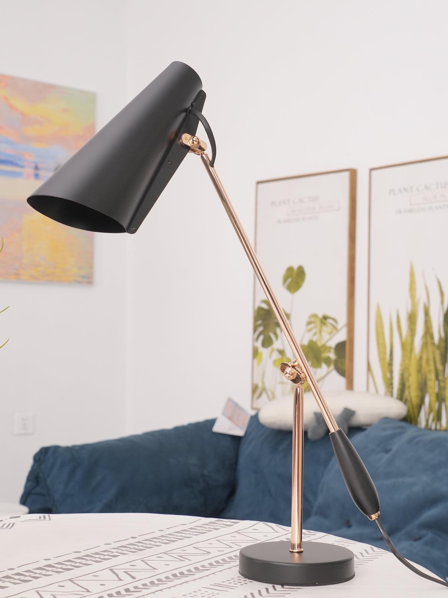 modern-birdy-table-lamp-with-adjustable-arm-and-minimalist-steel-design