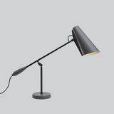 modern-birdy-table-lamp-with-adjustable-arm-and-minimalist-steel-design