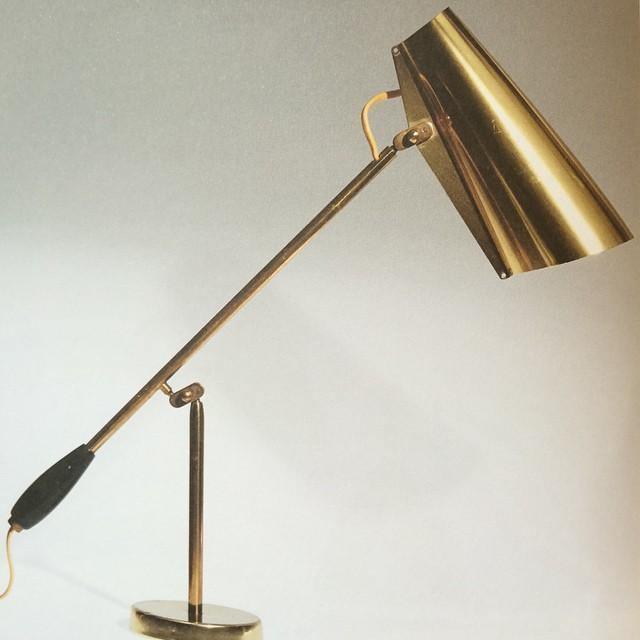 modern-birdy-table-lamp-with-adjustable-arm-and-minimalist-steel-design