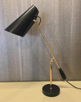 modern-birdy-table-lamp-with-adjustable-arm-and-minimalist-steel-design