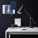 modern-birdy-table-lamp-with-adjustable-arm-and-minimalist-steel-design