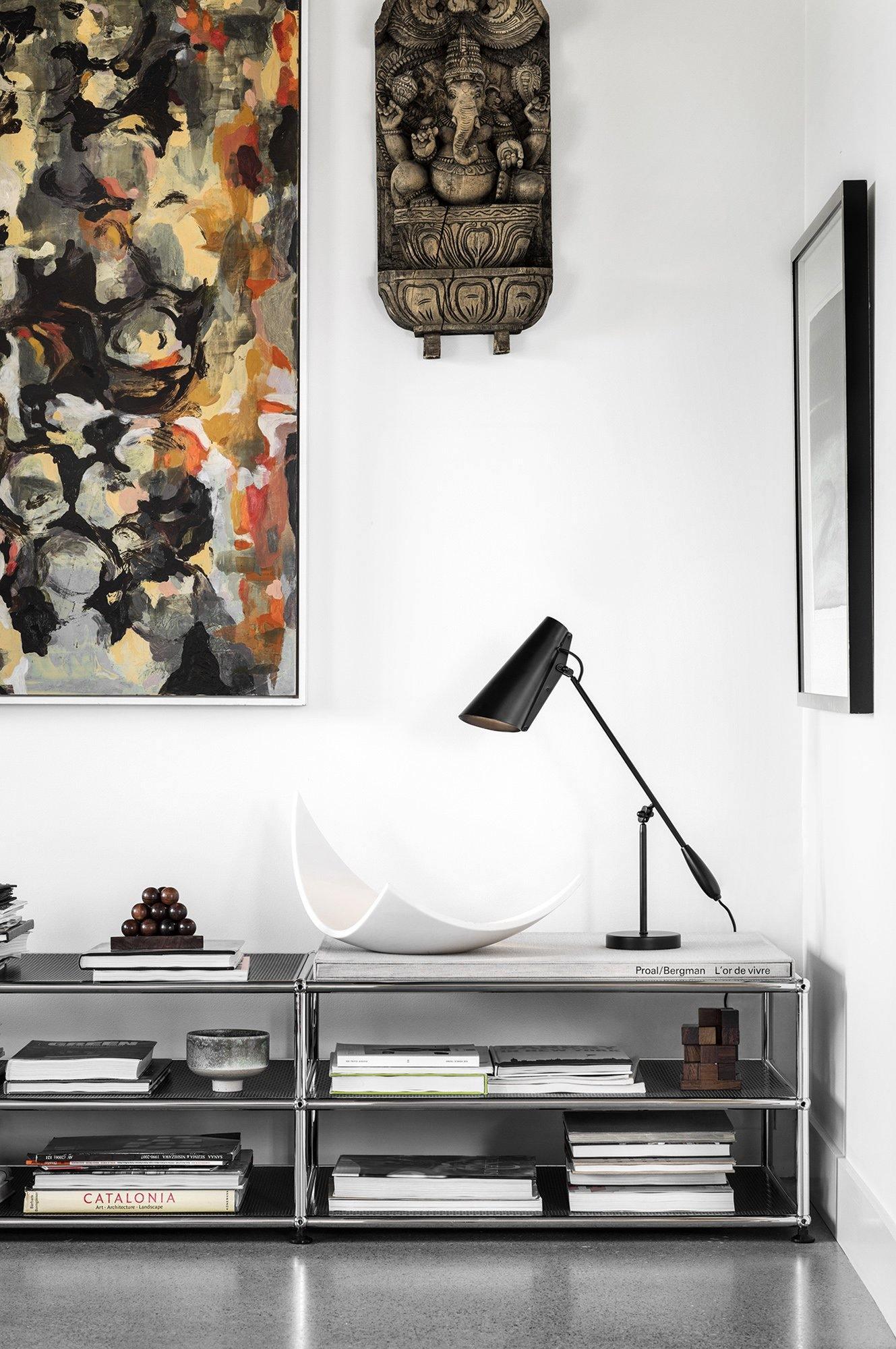 modern-birdy-table-lamp-with-adjustable-arm-and-minimalist-steel-design