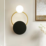 modern-geometric-black-and-gold-wall-sconce-with-white-glass-sphere-light-fixture