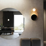 modern-geometric-black-and-gold-wall-sconce-with-white-glass-sphere-light-fixture