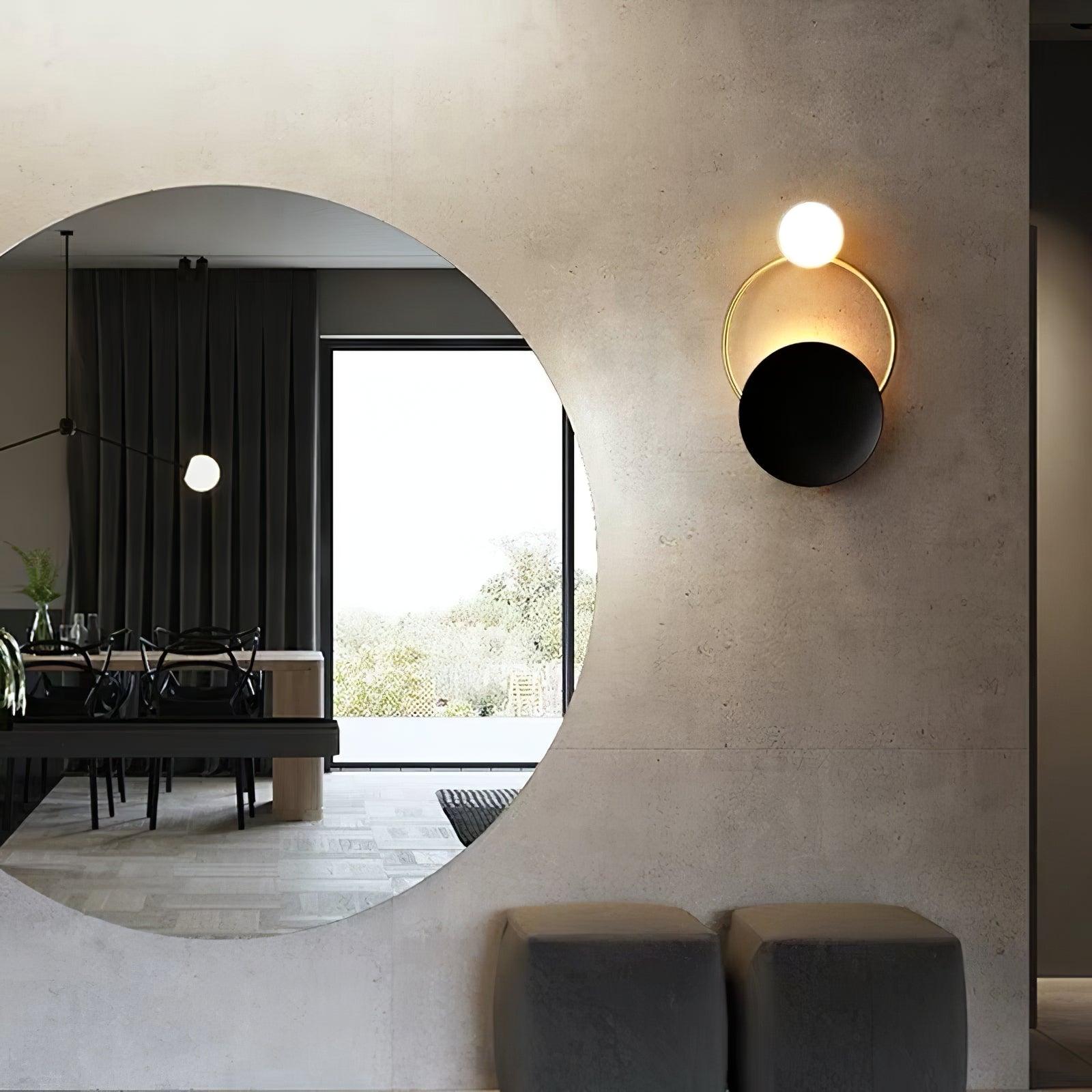 modern-geometric-black-and-gold-wall-sconce-with-white-glass-sphere-light-fixture