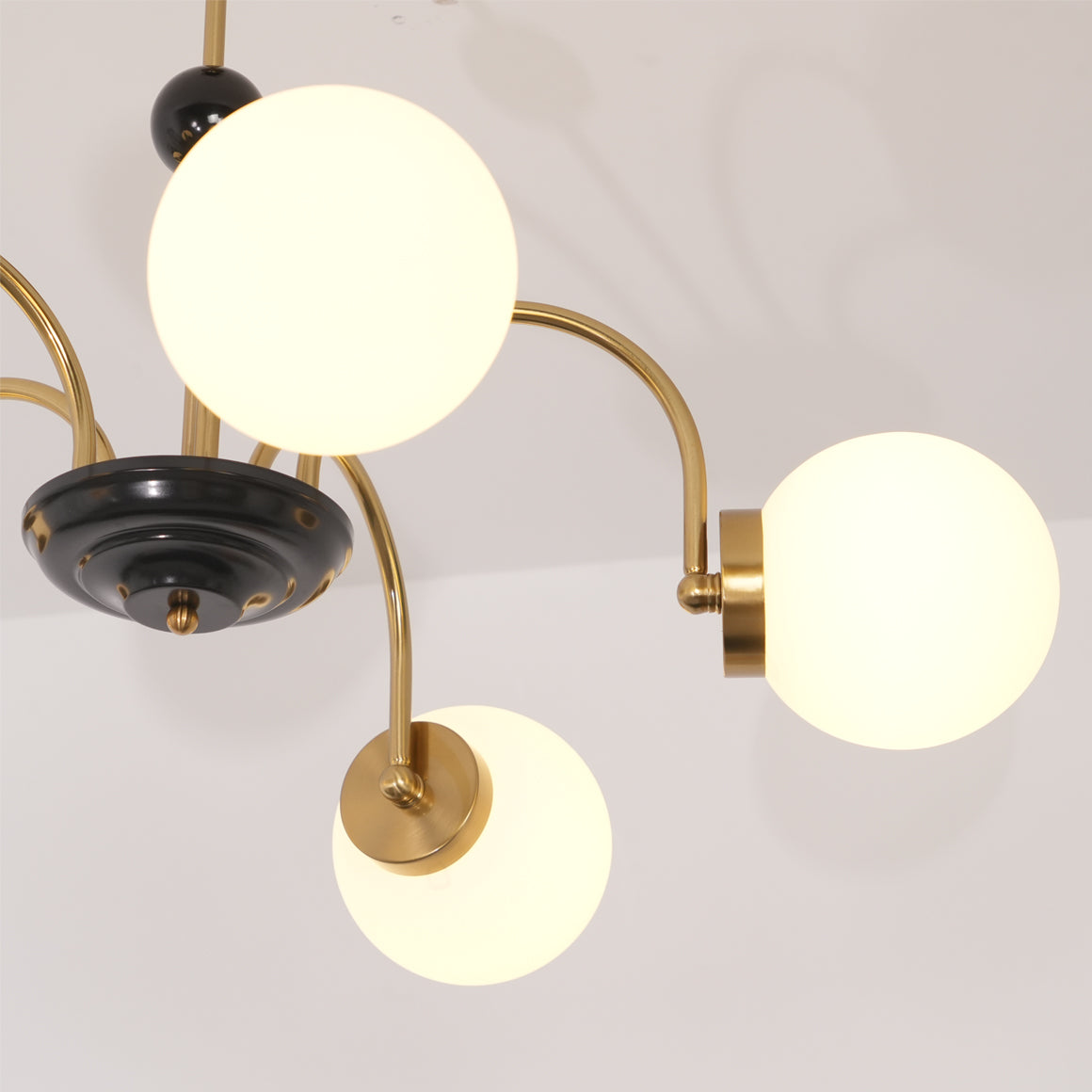 modern-mid-century-glass-globe-chandelier-with-metal-rod-frame-and-white-opal-shades