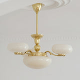 elegant-brass-and-cream-glass-orb-chandelier-mid-century-modern-pendant-light