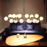 modern-glass-sphere-bubble-stick-chandelier-gold-metal-pendant-light-for-living-room