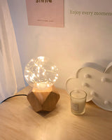 handcrafted-ash-wood-table-lamp-with-white-glass-globe-for-modern-bedside-lighting