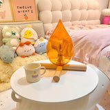 mid-century-campfire-table-lamp-with-orange-glass-shade-and-natural-wood-base