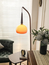 Modern Cantilever Floor Lamp with Walnut Wood Side Table and Orange Glass Shade